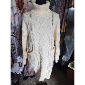 high-neck cable knit sweater dress with double pockets. Size S